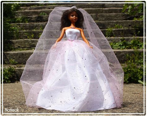 envie de réaliser une jolie robe de mariée pour la poupée barbie de votre enfant voici un tuto