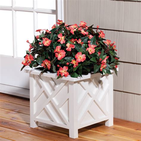And the outdoor faux plant selection in general (i.e., not just flowers, but trees, shrubs, ivy, ferns i see no issue with fake plants. Chippendale Planter - Outdoor Planter - Planter Box ...
