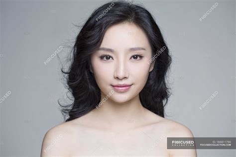 Portrait Of Beautiful Chinese Woman With Natural Makeup Styling Sensuality Stock Photo