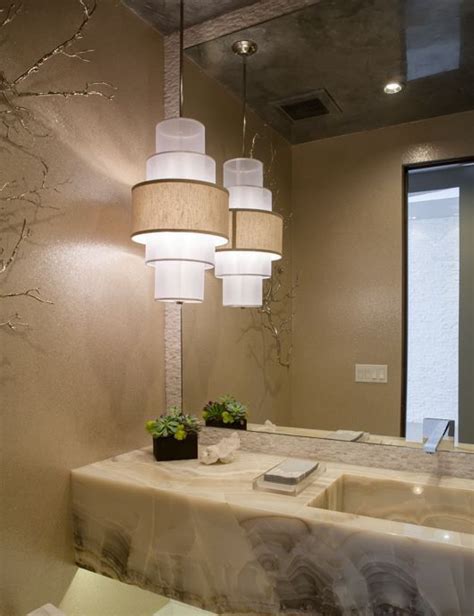 Beautiful Powder Room With Floating Onyx Countertop And Integrated Sink