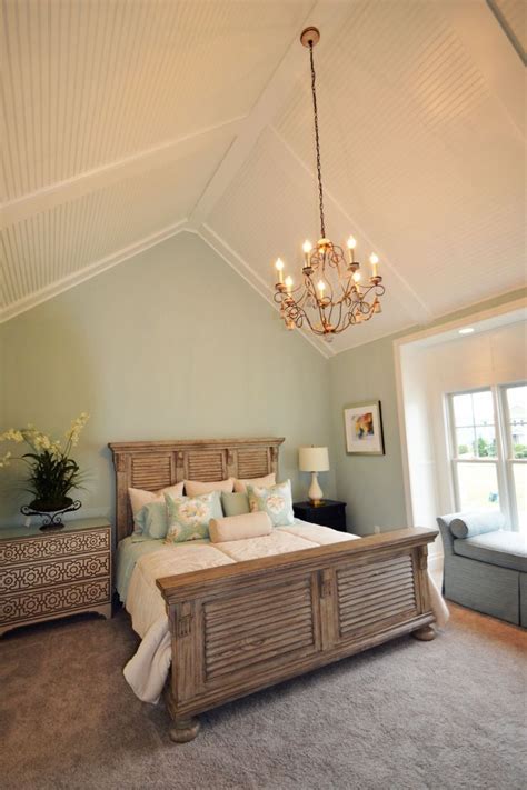 Top 70 best vaulted ceiling ideas high vertical space designs. Seaside Master Bedroom with vaulted ceiling with low ...