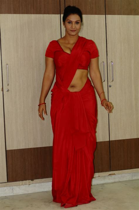 Telugu Actress Apoorva Aunty Hot In Red Saree Exposing Navel With Huge