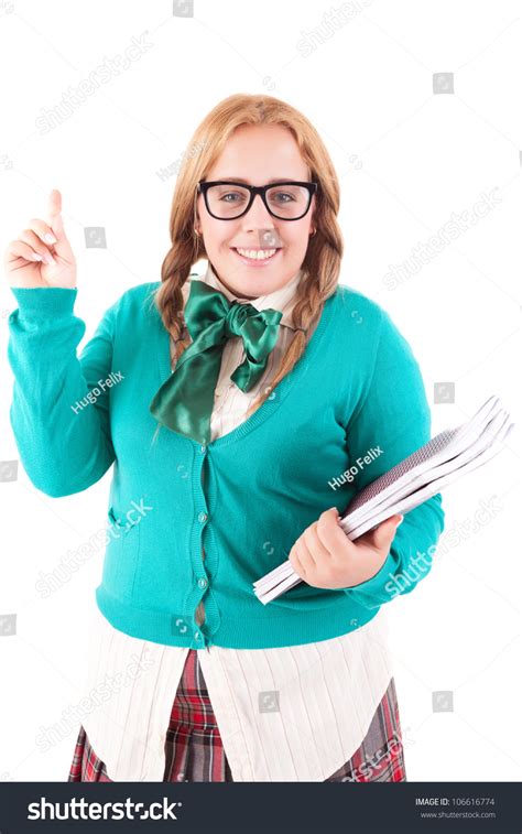 Silly Nerd Schoolgirl Posing Over A White Background Stock Photo