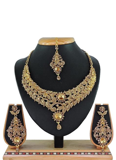Check out our solid gold necklace selection for the very best in unique or custom, handmade pieces from our necklaces shops. Buy Online Gold Stone Work Reception Necklace Set : 125369 ...