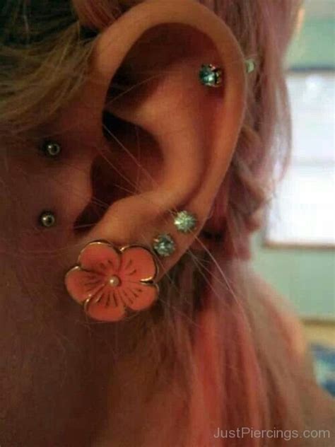 Lobe Flower Tragus And Helix Piercing