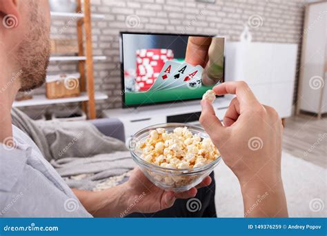 Man Eating Popcorn While Watching Television Stock Image Image Of