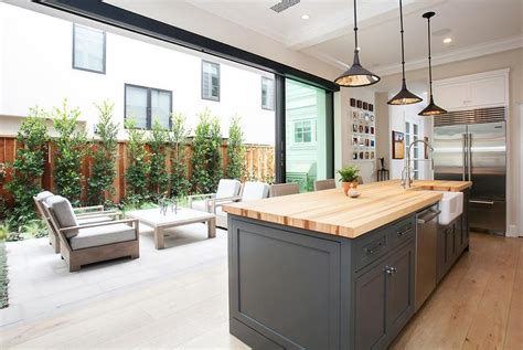 (photo courtesy of lacantina doors). Kitchen with Sliding Glass Patio Doors - Transitional ...