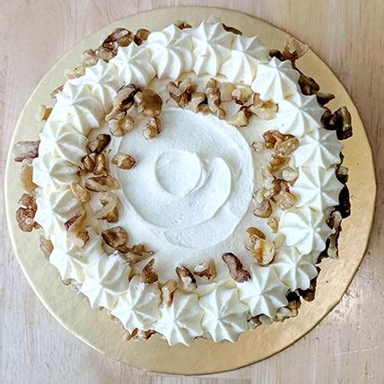 In a circular motion starting from the inside out, pour the ganache glaze 3. Online Carrot Cream Cheese Cake- 6 Inches Gift Delivery in ...