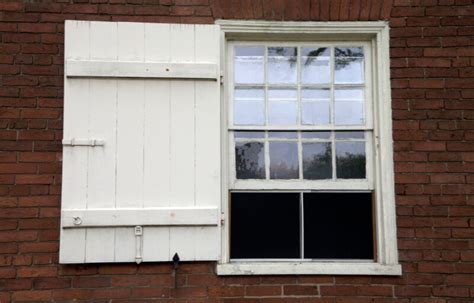 An Eight Over Twelve Sash Window With A Shutter Clippix Etc