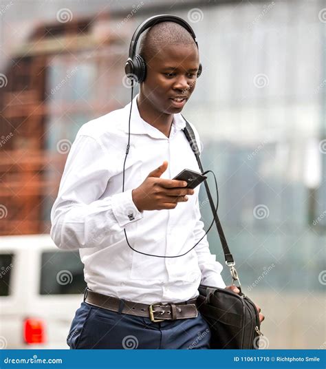 Man Walking With Headphones In City Editorial Image Image Of Hand
