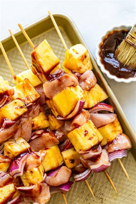 Next, thread the chicken, cubed pineapple, red peppers, and onion onto the skewers. Hawaiian Chicken BBQ Kabobs - The Toasted Pine Nut