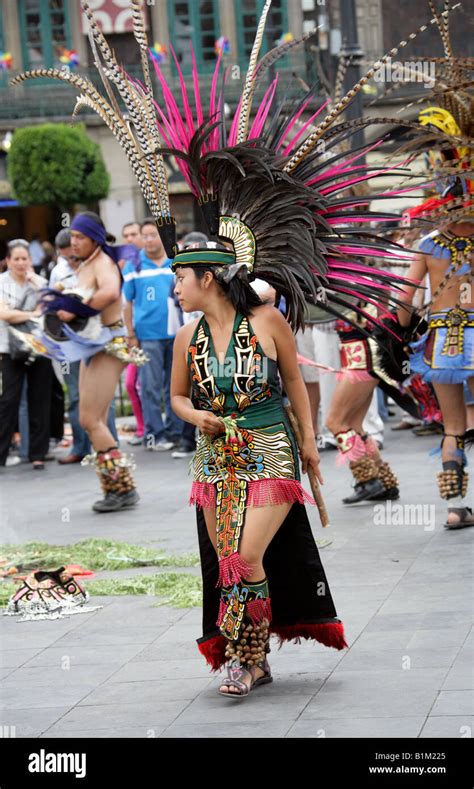 Young Mexican Woman Dancing In An Aztec Costume Zocalo Square Plaza