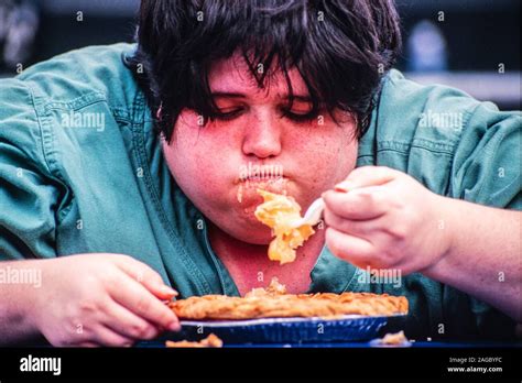 A Competitor Speedily Devours A Pie During A Pie Eating Contest Baltimore Maryland Usa Stock