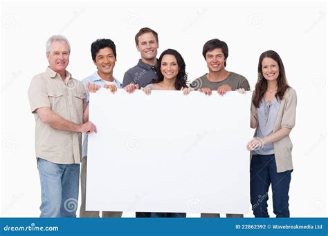 Smiling Group Holding Blank Sign Together Stock Photography Image