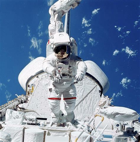 Astronaut During Spacewalk Photograph By Nasa Science Photo Library Fine Art America