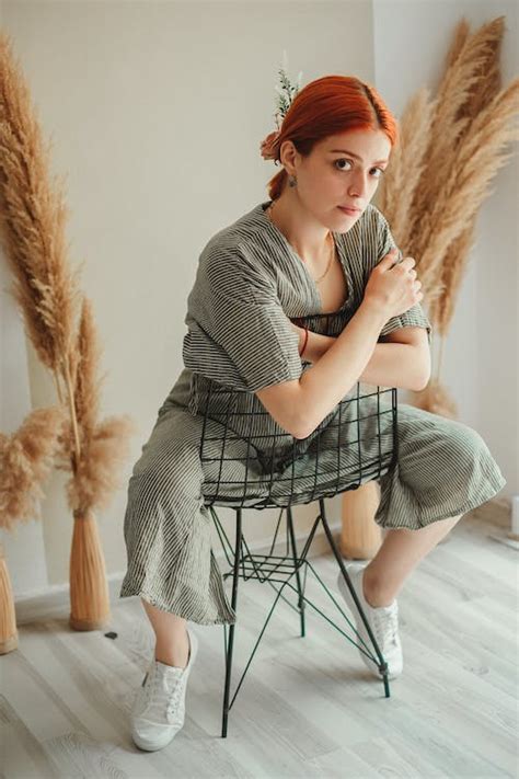 Woman Sitting Backward On Chair · Free Stock Photo