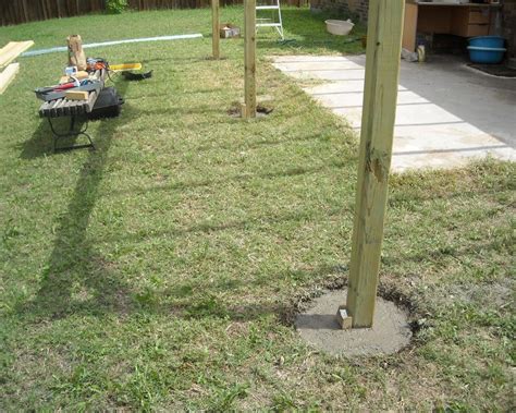 Concreting in fence posts is pretty simple when you know how. How to Build a Patio Cover with a Corrugated Metal Roof ...