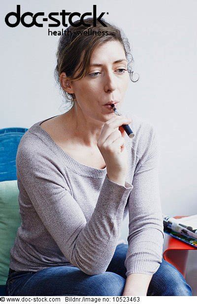 Woman Smoking Electronic Cigarette Rights Managed Image
