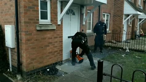 Watch The Moment Officers Break Down Front Door During Drugs Raid
