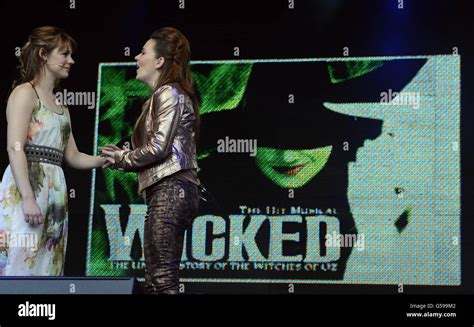 Members Of The Cast Of Wicked Perform On Stage As Part Of The West End