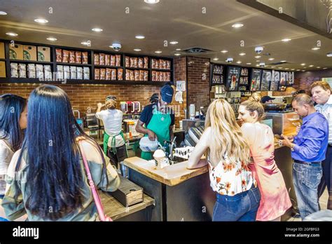 Starbucks barista apron hi-res stock photography and images - Alamy