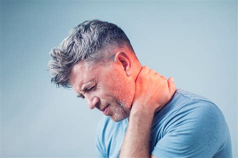 Young Man Suffering From Neck Pain Headache Pain Stock Photo Download