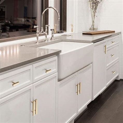 Traditional kitchen cabinets for a warm, homey feeling. White and Gold Kitchen Design Ideas Your Clients Will Love ...