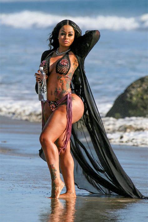 Blac Chyna Hits The Beach In String Bikini For Photo Shoot