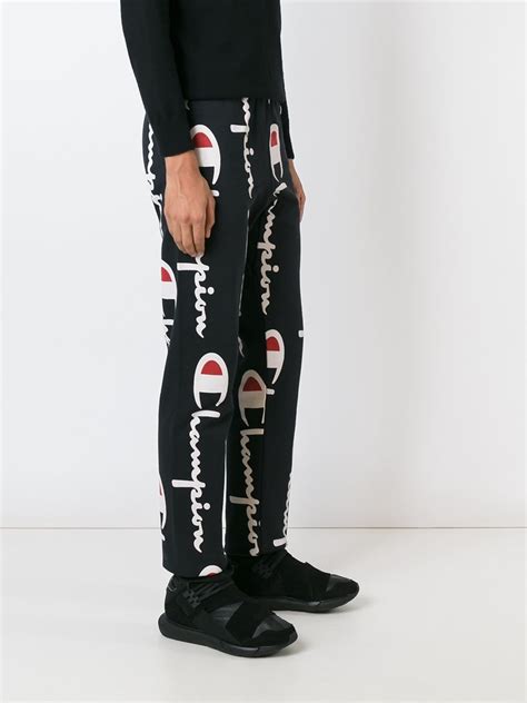 Champion Cotton All Over Logo Print Sweatpants In Black For Men Lyst