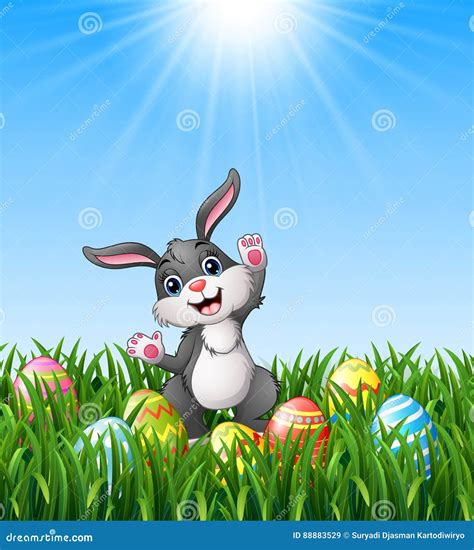 Cartoon Rabbit With Easter Eggs In The Grass Stock Vector