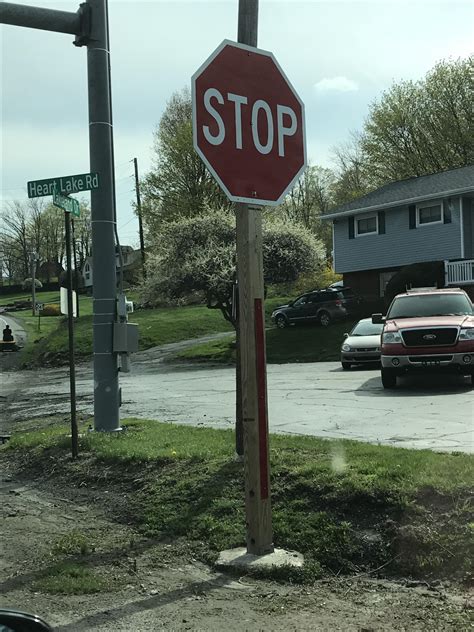 This weirdly large stop sign on a 4X4 post : mildlyinteresting