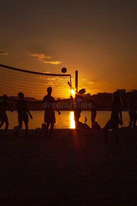 People Play Volleyball On The Beach Editorial Stock Image Image Of