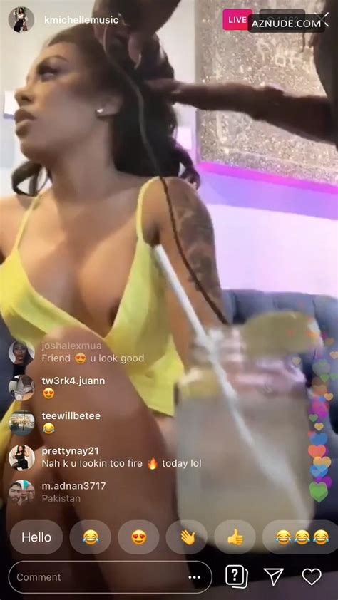 K Michelle Accidentally Shows Her Brown Areola Wearing A Yellow Dress