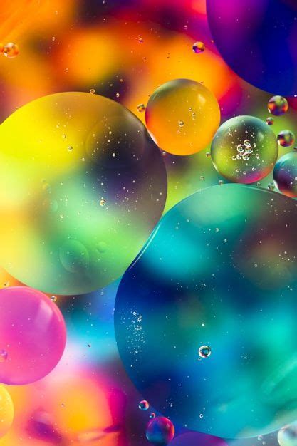 Rainbow Oil Drops On A Water Surface Abstract Background