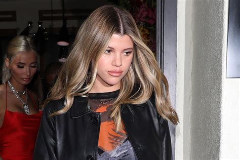 Sofia Richie Elevates Her Classic Black Tank And Ripped Jeans Combo With These Futuristic Boots