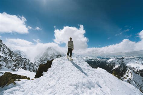 Person Standing On Slope Glacier Mountain · Free Stock Photo