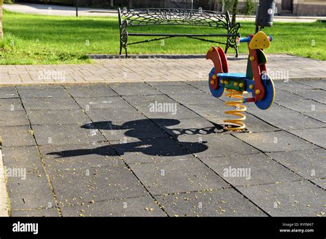 Swings And Slides In The Park For Children Playground Image Stock