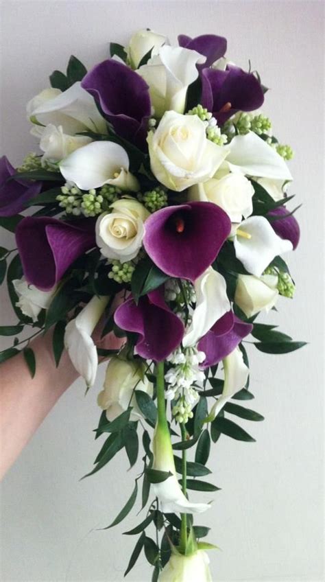 There is a misconception that learning how to make a diy wedding bouquet is an arduous feat, which it's absolutely not. Calla lily brides shower bouquet More | Purple wedding ...