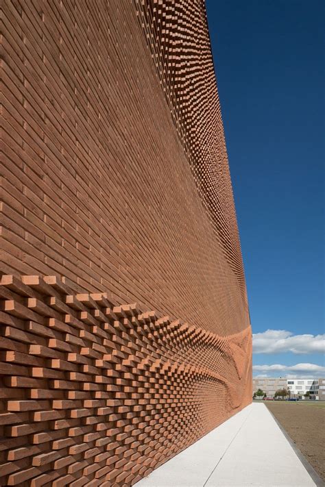 Architects Make The Brick Façade Look Like A Flowing