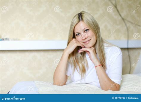 Charming Blonde Smiles And Poses For Camera Located In Sleeping Stock Image Image Of Gorgeous