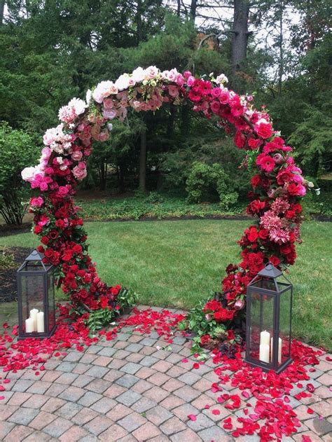 A Pretty Floral Wedding Arch Destinationweddingideas Wedding