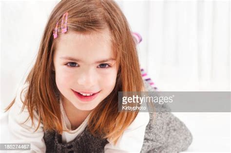 Smiling Little Girl High Res Stock Photo Getty Images