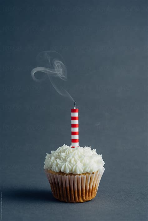Birthday Cake With A Smoking Candle By Stocksy Contributor Gabriel