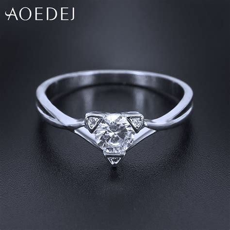 The white gold ring is over 10 times more expensive. AOEDEJ Triangle Crystal Ring Rose Gold Engagement Rings For Women Finger Ring Zircon Stone ...