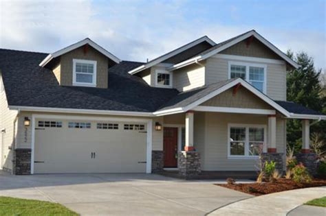 This modern front door design differs from the others thanks to the golden trimming of the window give your home a fairytale appearance with a gingerbread house doorway. Craftsman House Plans - Rockspring 30-897 - Associated Designs