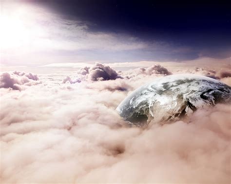 Planet Between Clouds 1280 X 1024 Wallpaper