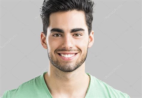 Handsome Man Smiling Stock Photo By ©ikostudio 75196567