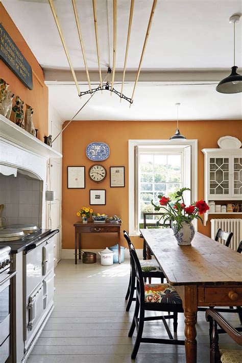There is a mix of black, glass, wood and metal. A Quintessential English Country Decor Guide