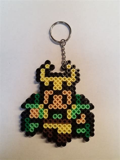 These fantastic and inexpensive little beads can be arranged in any shape or pattern you desire. Marvel Loki Mini Keychain | Etsy in 2020 | Perler bead art ...