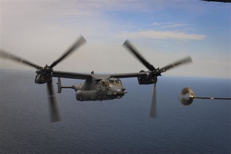 A Cv 22 Osprey Approaches The Air Refueling Receptacle Of An Mc 130h